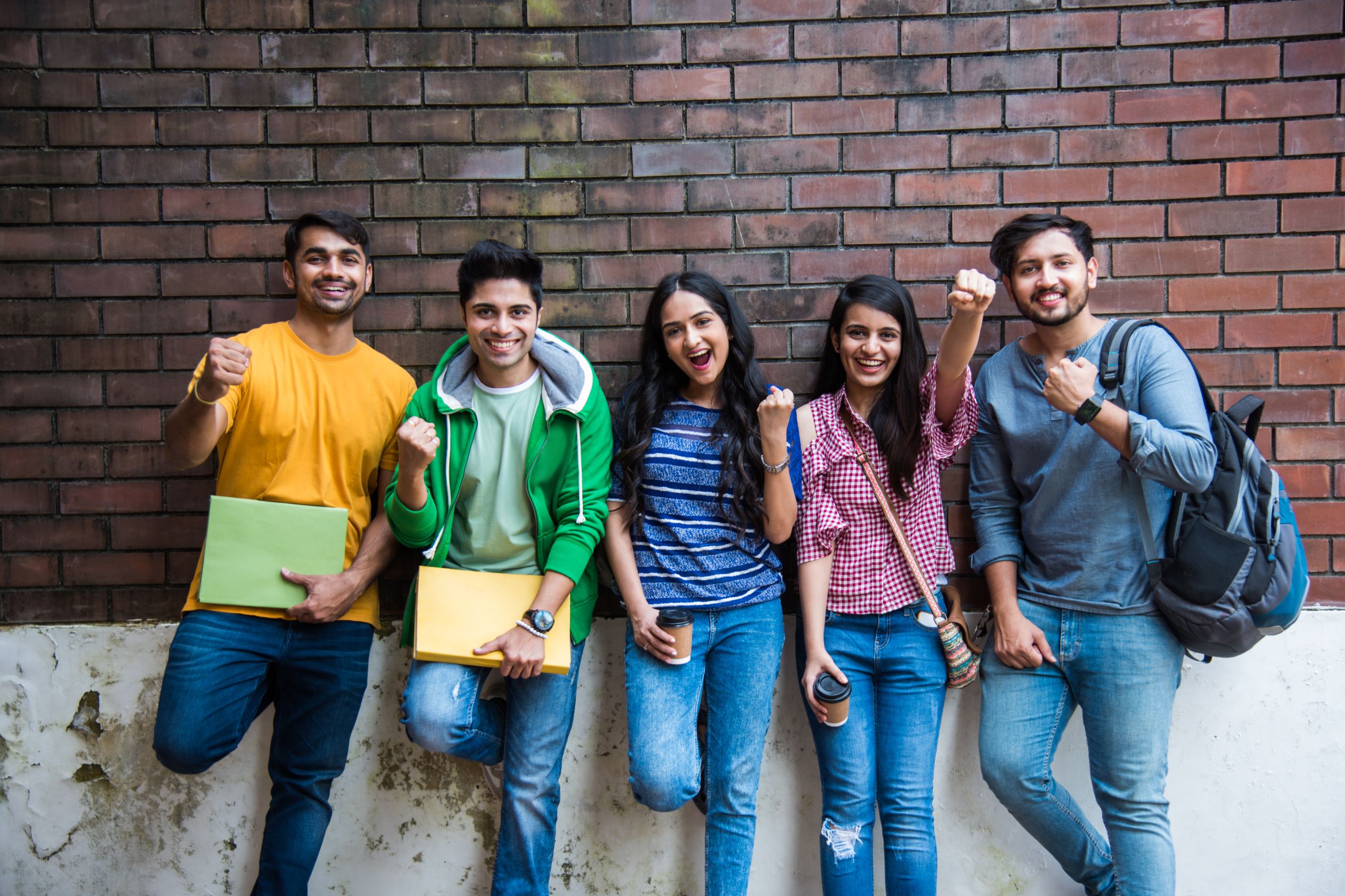 5 students giviing pose outside of the Tagore Educons consultancy